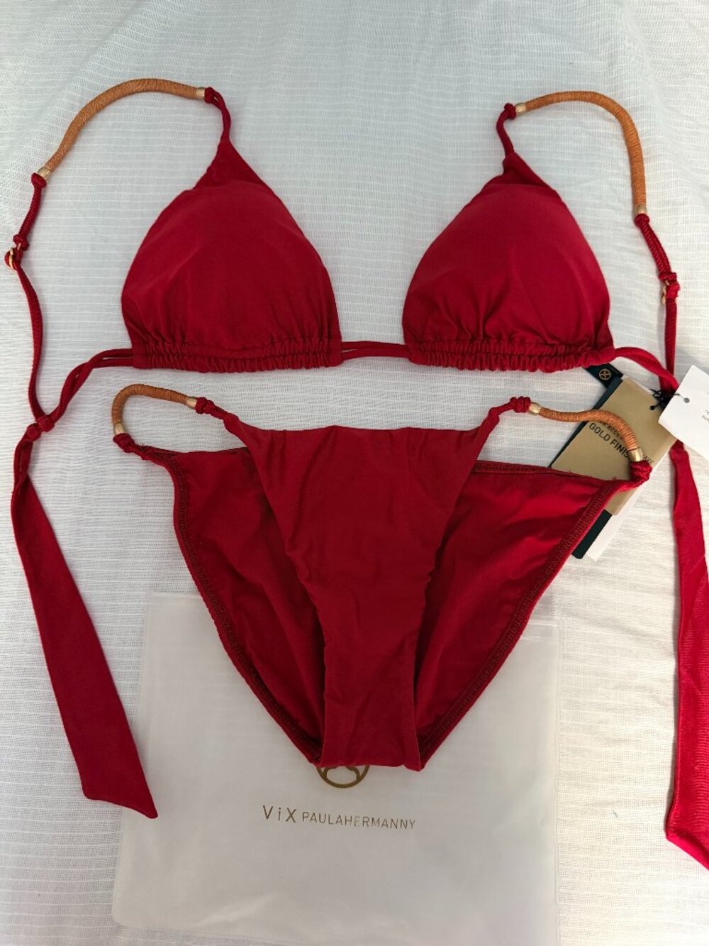 Red bikini set, made by VIX Paula Hermanny